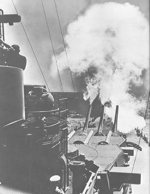 USS North Carolina firing over bow