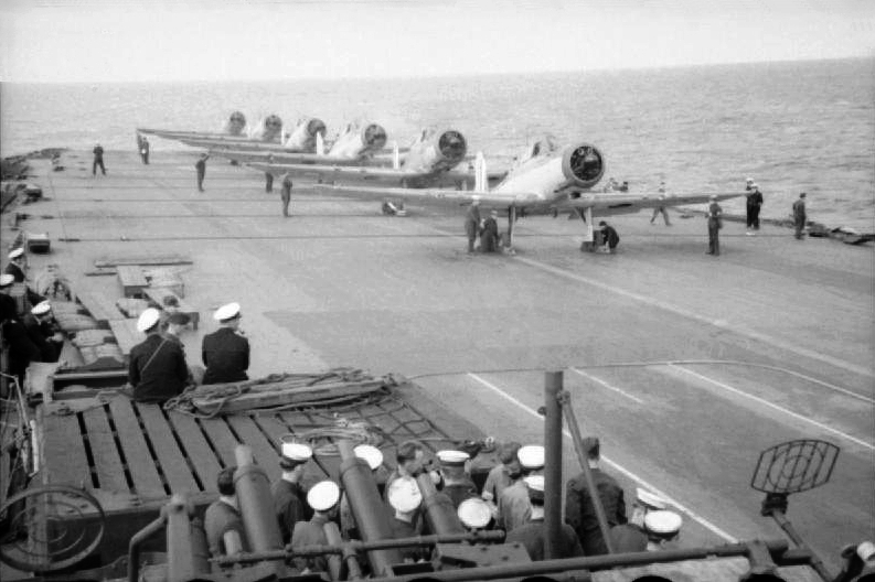HMS Ark Royal planes preparing to depart for the harbor