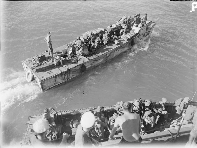 Indian troops from the cruiser HMS Kenya onboard LCA 346