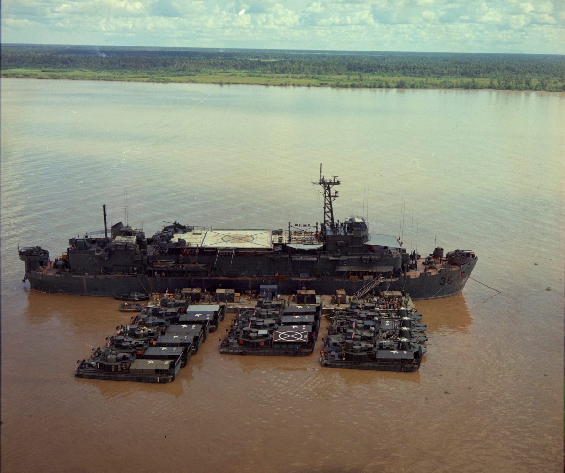 NARA USS Benewah and smaller craft on My Tho River circa 1967