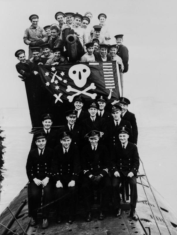 HMS Proteus returning from a mission, proudly displaying the Jolly Rogers and its hunting board, Plymouth 30 October 1942