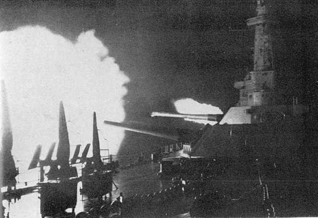 USS Washington, winner of her duel with IJN Kirishima, opening fire at the early hours of November 1942