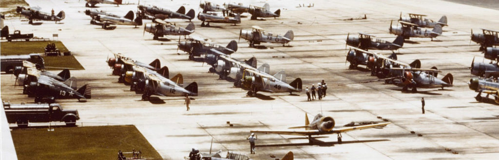 Training aircraft, including the F3F at Naval Air Station Miami, circa 1942