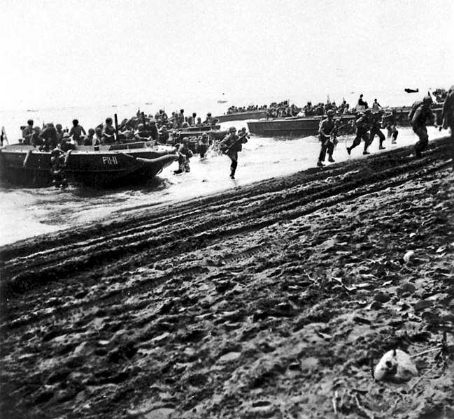U.S. Marines lands from LCP(L)s onto Guadalcanal